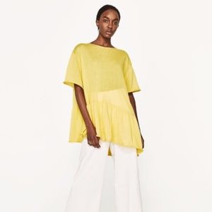 Yellow asymmetrical top with ruffles